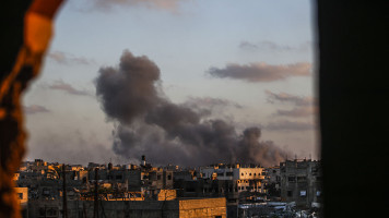 Smoke rises from residential area after an Israeli attack on Jabalia Refugee Camp on Gaza City