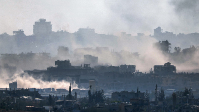 A picture taken from Israeli border with the Gaza Strip shows smoke billowing during Israeli bombardment in the besieged Palestinian territory on May 29, 2025. 